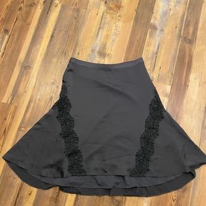 Banana Republic Silk Skirt, Size 8 with intricate detailing.